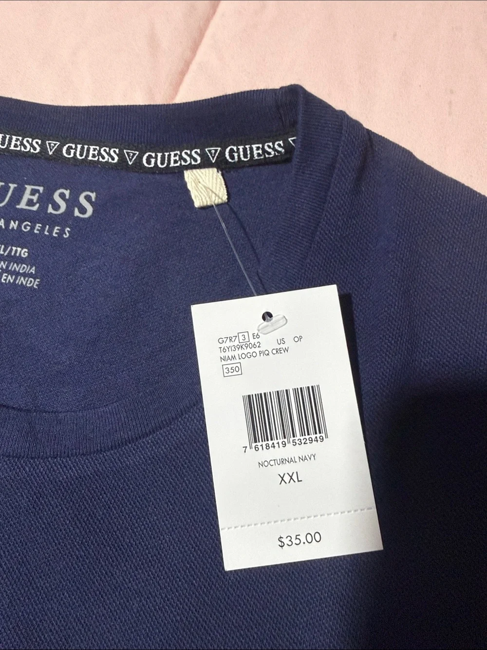 GUESS Navy Blue Short-Sleeve Logo Tee with Red & White Stripes
Several sizes - Picture 2 of 3